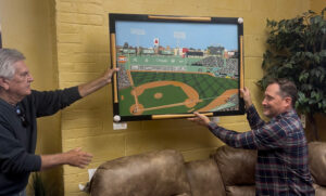 ”Fenway,” by artist Tim Campbell, departs the Gallery @ Syd’s, returning to his family.